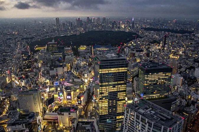 Central Tokyo glowing at dusk seen from the air on a night Tokyo helicopter tour