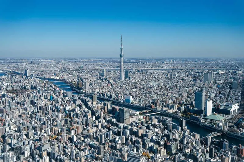 Helicopter cruising past the Tokyo Skytree tower above Shibuya and Shinjuku on a Tokyo helicopter tour