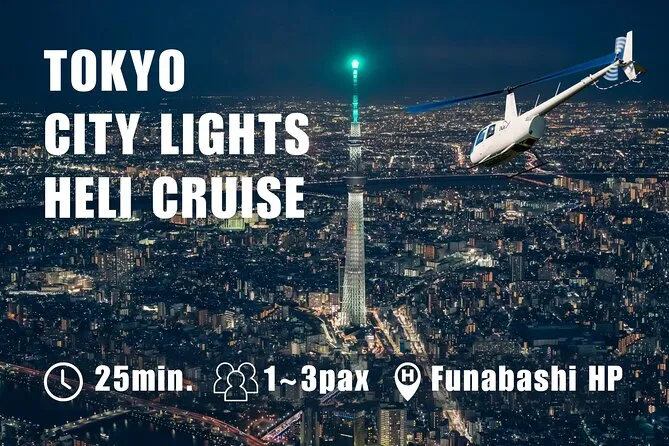 Aerial view of downtown Tokyo with Tokyo Tower and Skytree lit up at night from a Tokyo helicopter tour